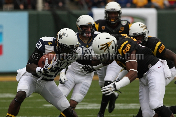 122912 Kraft SA-025.JPG - Dec 29, 2012; San Francisco, CA, USA; Navy Midshipmen Gee Gee Greene (21) completes a run following reception against the Arizona State Sun Devils in the 2012 Kraft Fighting Hunger Bowl at AT&T Park.